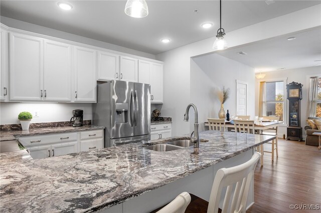 5301 Old Main St Unit A, Henrico, VA 23231 - kitchen featuring stainless steel fridge with ice dispenser, a sink, stone counters, white cabinetry, and recessed lighting