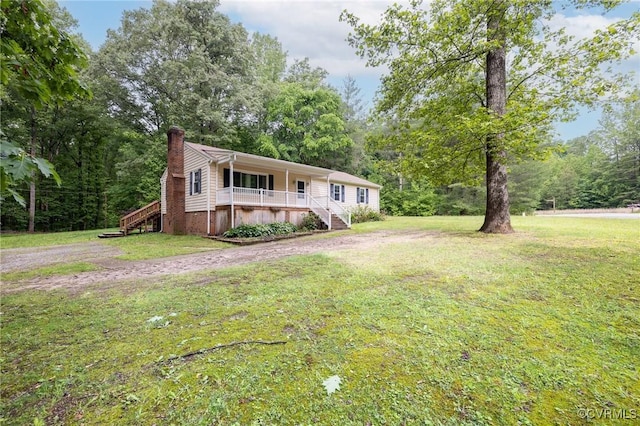 9830 Knobs Hill Ln, Amelia Courthouse, VA 23002 - ranch-style home featuring a chimney, stairway, covered porch, and a front yard