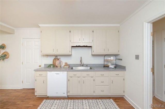 9830 Knobs Hill Ln, Amelia Courthouse, VA 23002 - kitchen featuring dishwasher, a sink, light wood finished floors, crown molding, and baseboards