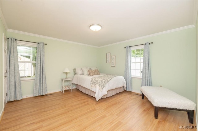 9830 Knobs Hill Ln, Amelia Courthouse, VA 23002 - bedroom with light wood finished floors, crown molding, and baseboards
