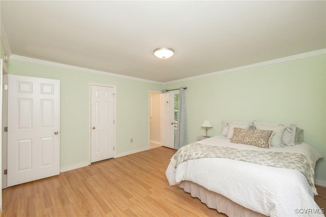 9830 Knobs Hill Ln, Amelia Courthouse, VA 23002 - bedroom with crown molding, light wood-style flooring, and baseboards