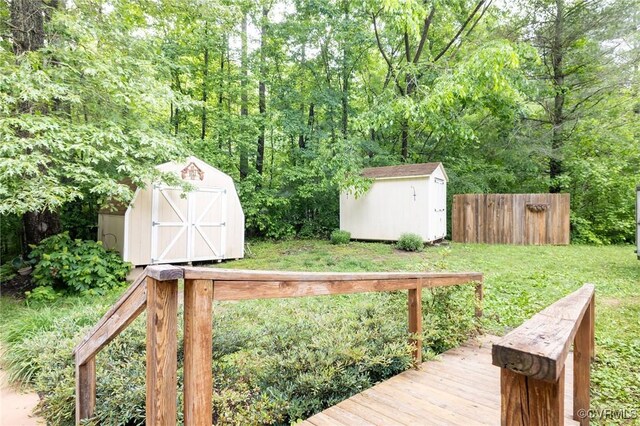 9830 Knobs Hill Ln, Amelia Courthouse, VA 23002 - view of yard featuring a shed, an outbuilding, and a forest view