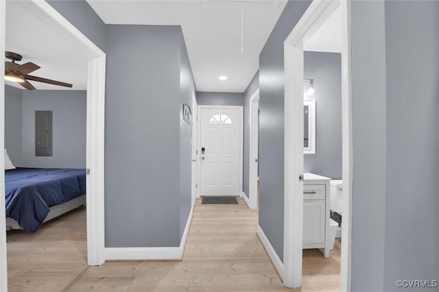 686 Shore Dr, Hartfield, VA 23071 - hall featuring electric panel, attic access, light wood-style floors, baseboards, and recessed lighting
