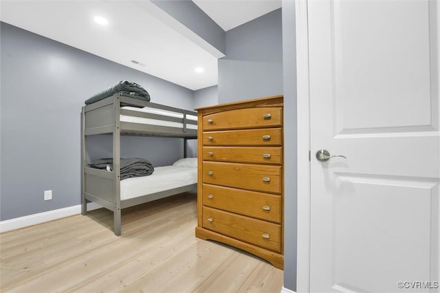 686 Shore Dr, Hartfield, VA 23071 - bedroom featuring light wood-style floors and baseboards