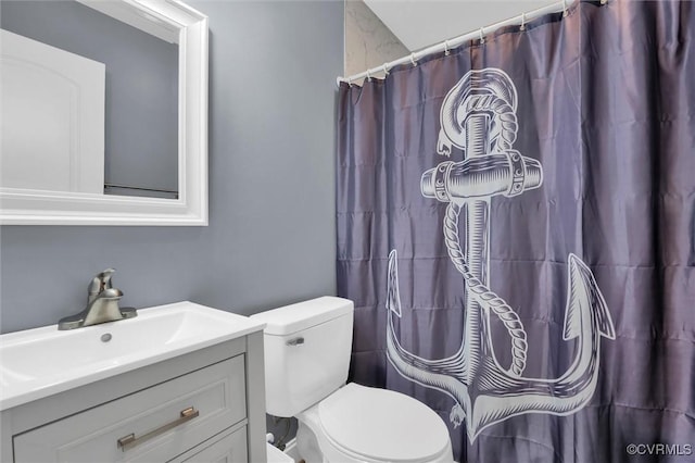 686 Shore Dr, Hartfield, VA 23071 - full bath with toilet, vanity, and curtained shower