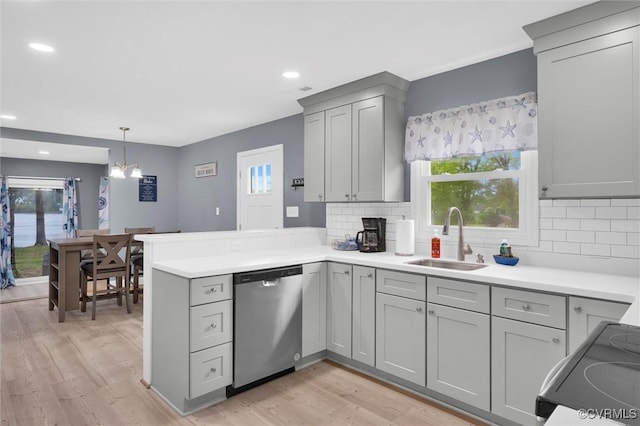 686 Shore Dr, Hartfield, VA 23071 - kitchen with dishwasher, a sink, gray cabinets, a peninsula, and recessed lighting