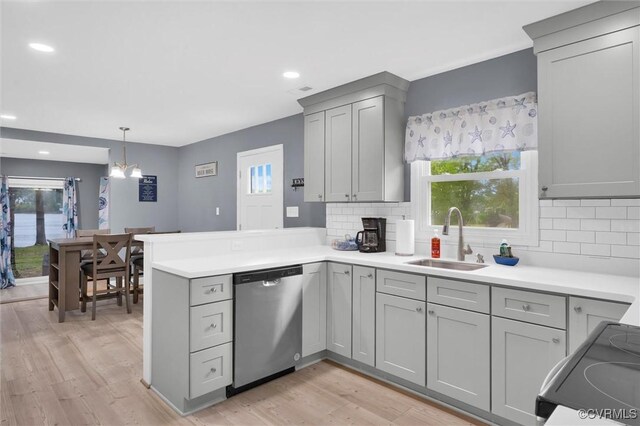 686 Shore Dr, Hartfield, VA 23071 - kitchen featuring dishwasher, a sink, gray cabinetry, a peninsula, and recessed lighting