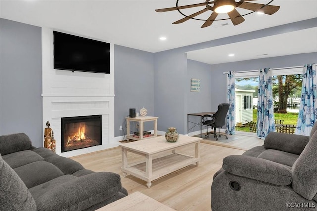 686 Shore Dr, Hartfield, VA 23071 - living area featuring ceiling fan, light wood-style flooring, recessed lighting, a desk, and a large fireplace
