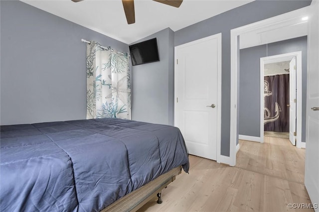 686 Shore Dr, Hartfield, VA 23071 - bedroom with wood finished floors, baseboards, and ceiling fan