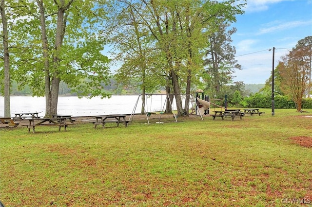 686 Shore Dr, Hartfield, VA 23071 - view of grassy yard with a water view and a playground
