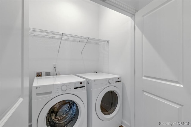926 Old Saint Johns Rd, Irvington, VA 22480 - laundry area featuring washer and clothes dryer