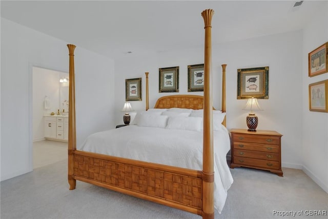 926 Old Saint Johns Rd, Irvington, VA 22480 - carpeted bedroom with connected bathroom
