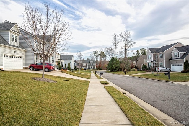 view of asphalt road featuring a residential view, sidewalks, and curbs