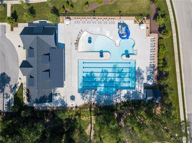 drone / aerial view of a pool area