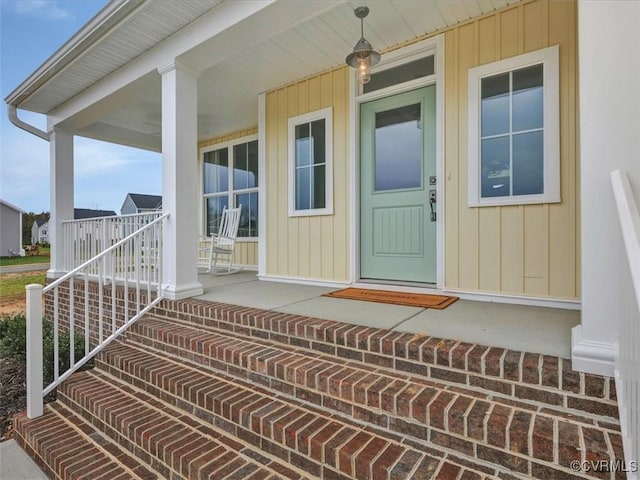 entrance to property with a porch