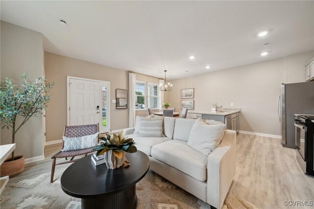 5912 Banyan Ln, Chesterfield, VA 23234 - living area with a chandelier, light wood-style floors, baseboards, and recessed lighting