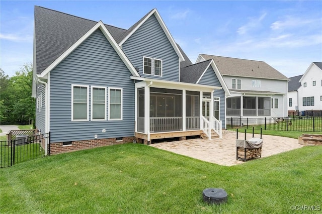 rear view of property featuring a sunroom, a patio, crawl space, and a shingled roof