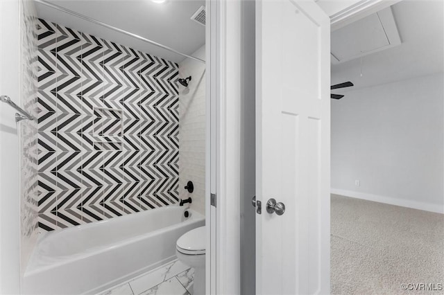 full bathroom featuring shower / tub combination, toilet, and baseboards