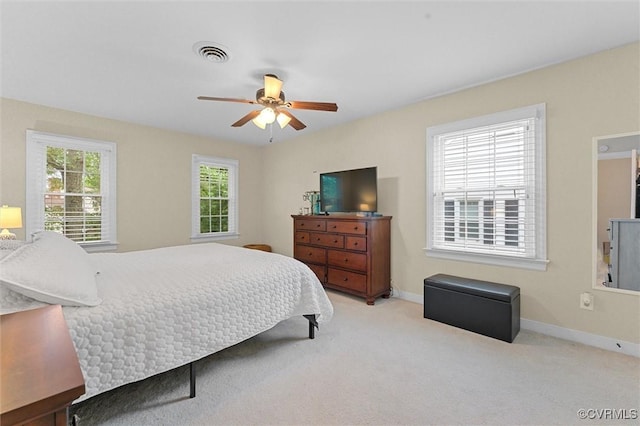 bedroom with baseboards and carpet flooring