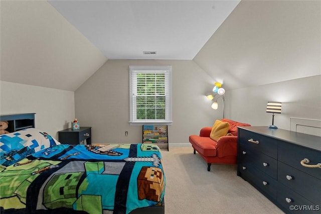 bedroom featuring carpet flooring and lofted ceiling