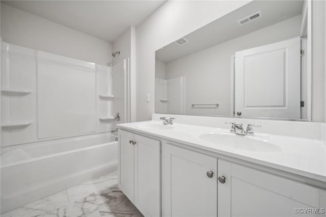 7013 Greenholm Pl, Chesterfield, VA 23234 - bathroom with marble finish floors, double vanity, and bathing tub / shower combination