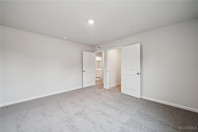 7013 Greenholm Pl, Chesterfield, VA 23234 - unfurnished bedroom featuring carpet floors and baseboards