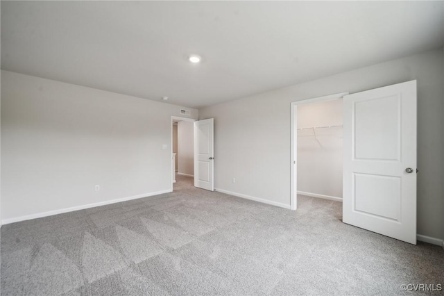 7013 Greenholm Pl, Chesterfield, VA 23234 - unfurnished bedroom with carpet flooring, baseboards, a spacious closet, a closet, and recessed lighting
