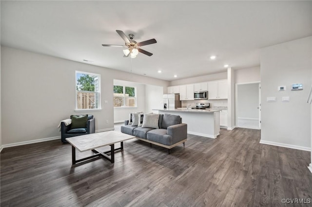 7013 Greenholm Pl, Chesterfield, VA 23234 - living room featuring ceiling fan, baseboards, dark wood-style flooring, and recessed lighting