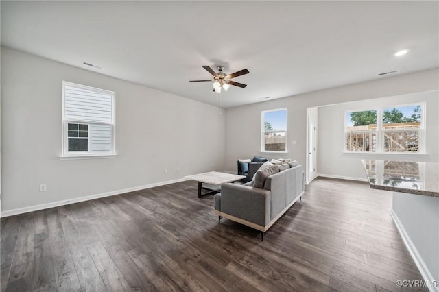 7013 Greenholm Pl, Chesterfield, VA 23234 - living area featuring dark wood-style flooring, baseboards, and a ceiling fan