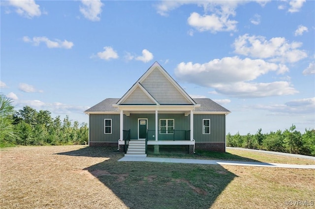 10940 Cross County Rd, Mineral, VA 23117 - view of front of home with covered porch and a front lawn