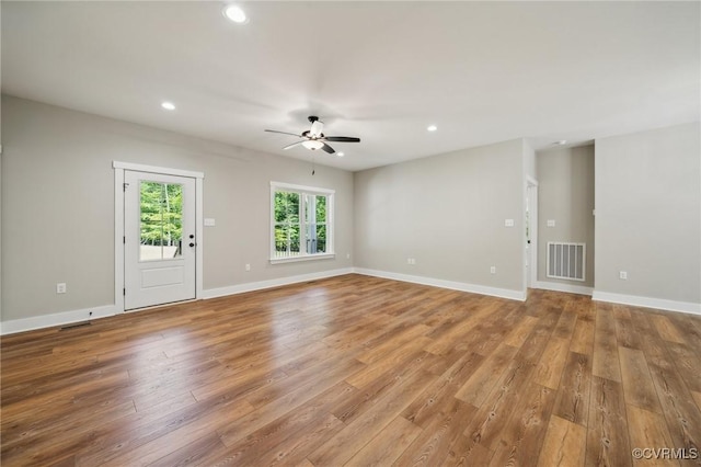 10940 Cross County Rd, Mineral, VA 23117 - unfurnished room with a ceiling fan, light wood-type flooring, recessed lighting, and baseboards