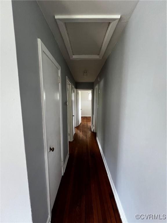corridor with wood finished floors