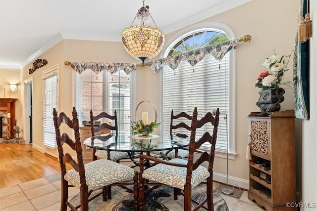 11216 Woodstock Heights Dr, Glen Allen, VA 23059 - dining room with plenty of natural light, ornamental molding, baseboards, and light tile patterned flooring