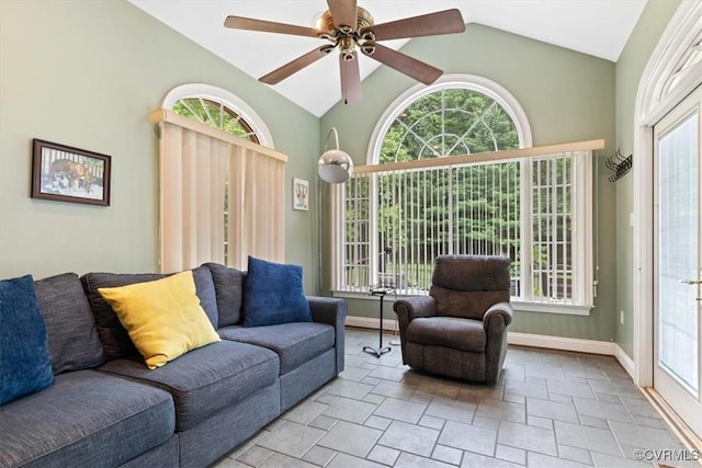 11216 Woodstock Heights Dr, Glen Allen, VA 23059 - living area featuring vaulted ceiling, healthy amount of natural light, baseboards, and a ceiling fan