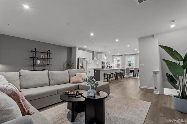 13285 Coalfield Station Ln, Midlothian, VA 23114 - living area featuring wood finished floors and recessed lighting
