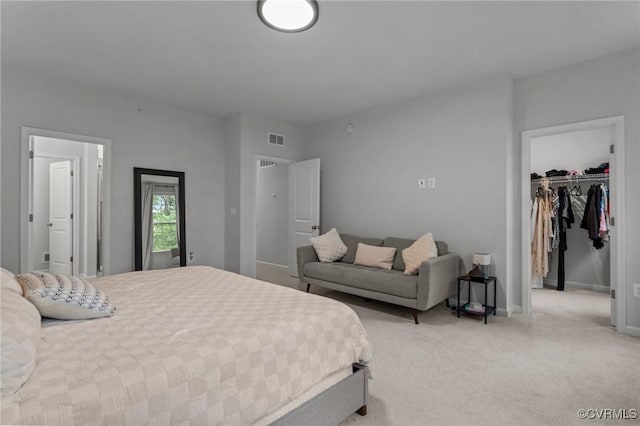 13285 Coalfield Station Ln, Midlothian, VA 23114 - bedroom with light carpet, a walk in closet, baseboards, and a closet