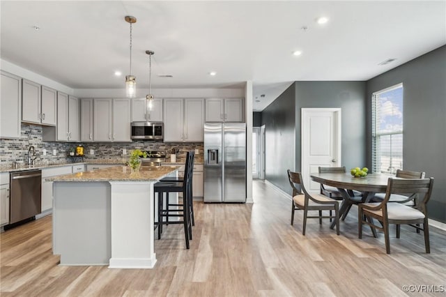 7201 Hancock Chase Ct Unit J2, Chesterfield, VA 23832 - kitchen featuring appliances with stainless steel finishes, gray cabinetry, backsplash, baseboards, and recessed lighting
