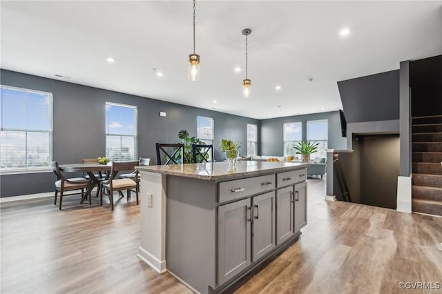 7201 Hancock Chase Ct Unit J2, Chesterfield, VA 23832 - kitchen with gray cabinets, recessed lighting, a kitchen island, light wood-style floors, and open floor plan