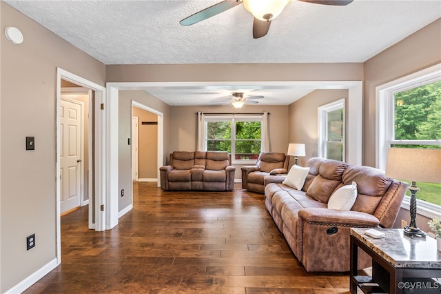 1112 Scotts Bottom Rd, Dillwyn, VA 23936 - living area with a ceiling fan, dark wood-style floors, and a textured ceiling