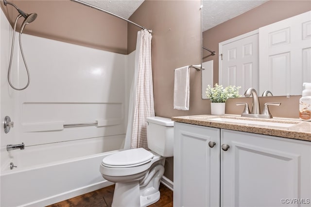 1112 Scotts Bottom Rd, Dillwyn, VA 23936 - full bath featuring vanity, shower / tub combo with curtain, a textured ceiling, and wood finished floors