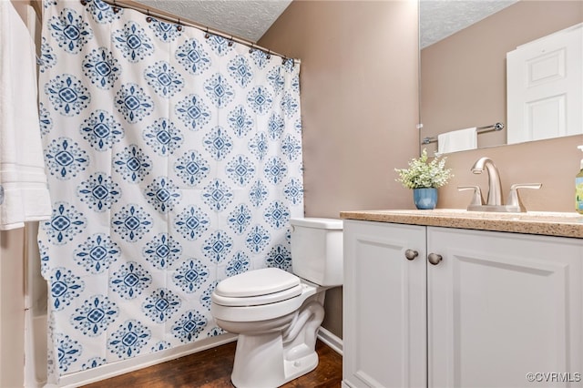 1112 Scotts Bottom Rd, Dillwyn, VA 23936 - full bath with a textured ceiling, wood finished floors, and vanity