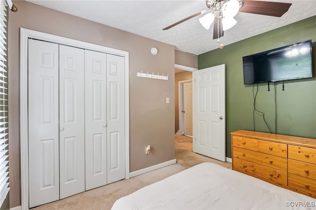 1112 Scotts Bottom Rd, Dillwyn, VA 23936 - carpeted bedroom with a closet, a ceiling fan, and a textured ceiling