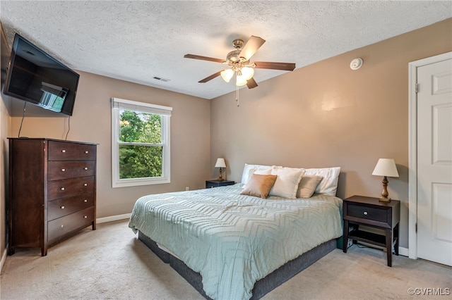 1112 Scotts Bottom Rd, Dillwyn, VA 23936 - carpeted bedroom with a textured ceiling and a ceiling fan