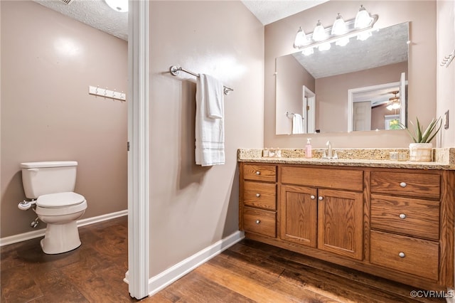 1112 Scotts Bottom Rd, Dillwyn, VA 23936 - bathroom with vanity, wood finished floors, a textured ceiling, and ceiling fan