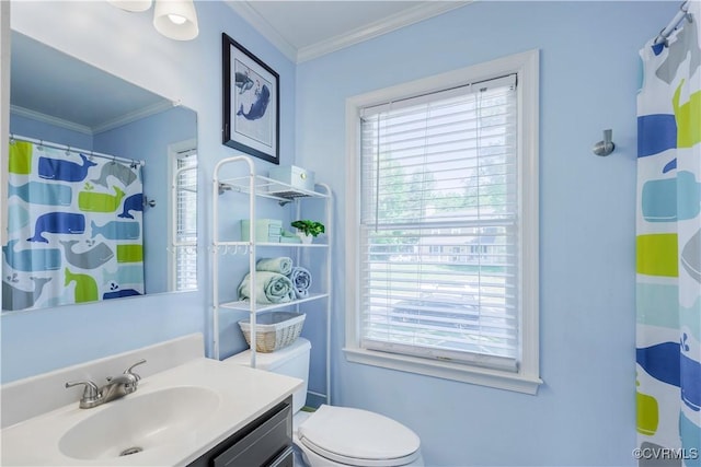 bathroom featuring healthy amount of natural light, ornamental molding, vanity, toilet, and a shower with shower curtain