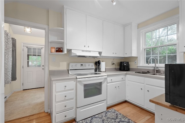 kitchen featuring under cabinet range hood, white electric range oven, a sink, open shelves, and white cabinets