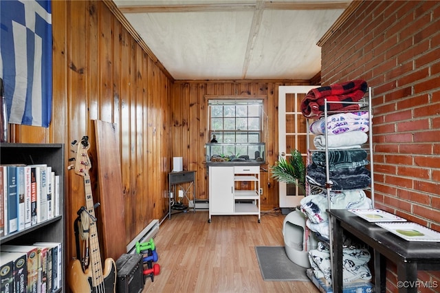 storage room featuring a baseboard heating unit and baseboard heating