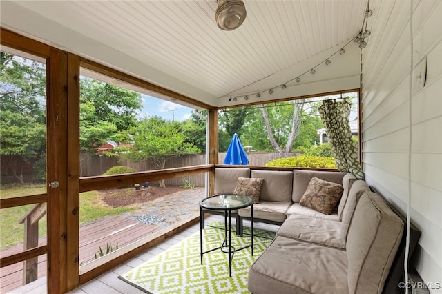 deck featuring a fenced backyard, an outdoor hangout area, and a patio