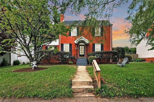 1709 Avondale Ave, Richmond, VA 23227 - colonial home featuring brick siding and a chimney