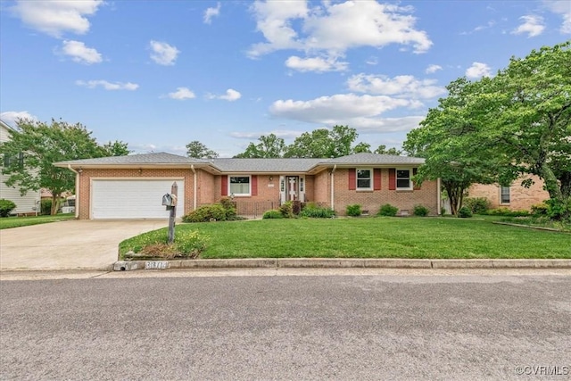 3304 N Marion Ave, Hopewell, VA 23860 - ranch-style house with concrete driveway, a garage, a front lawn, and brick siding